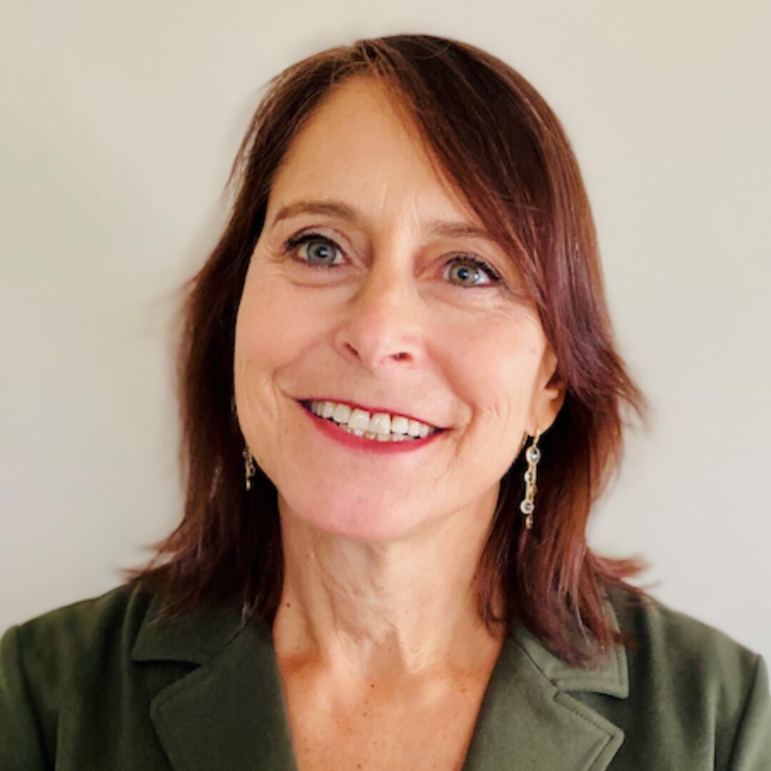 A headshot of Anne Miller, the PFLAG NYC Board Chair