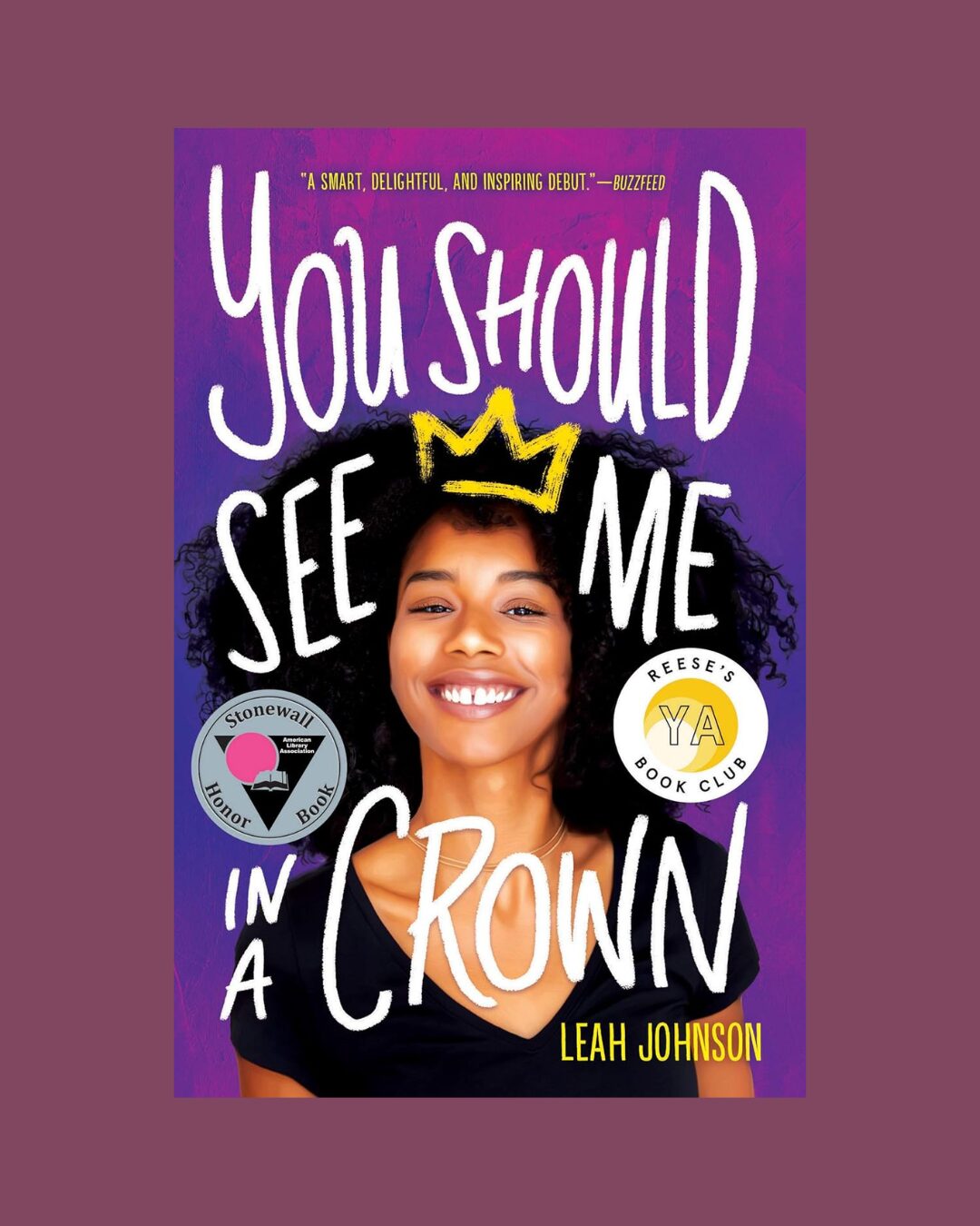 The cover of the book You Should See Me in a Crown on a purple background