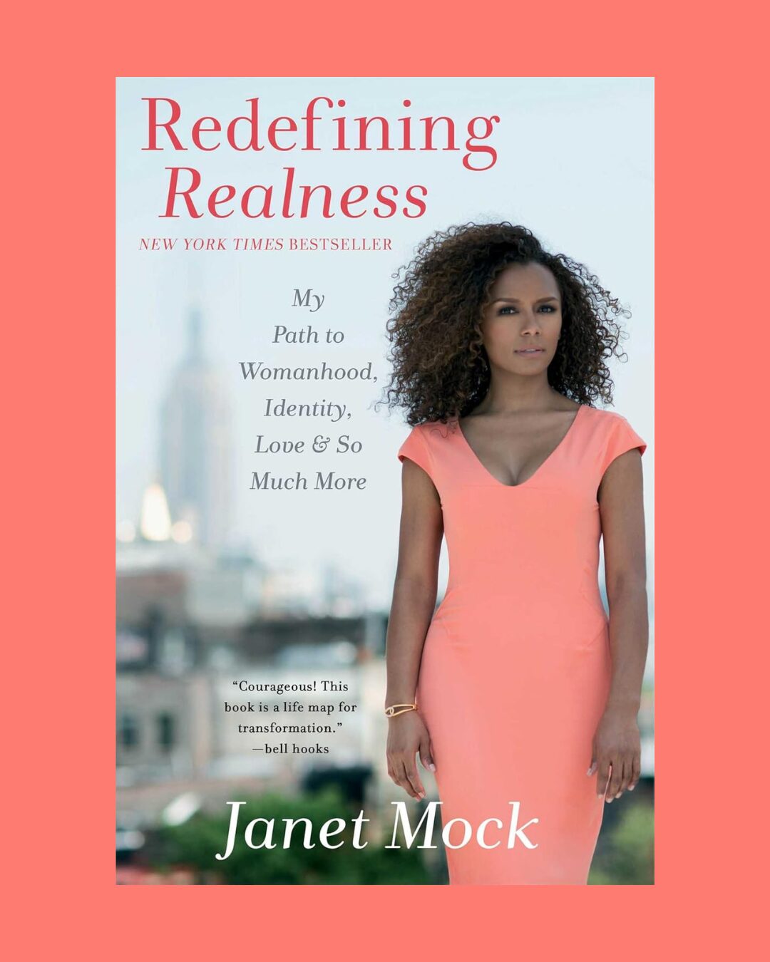 The cover of the book Redefining Realness: My Path to Womanhood, Identity, Love, & So Much More on a coral background