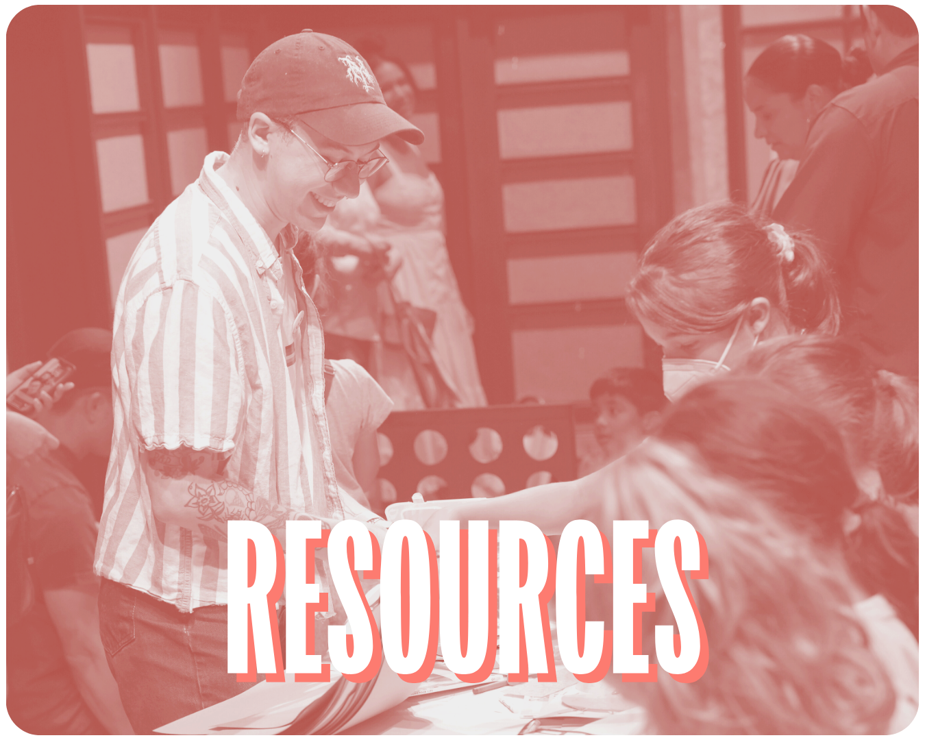 A coral-filtered image of a PFLAG NYC staff members standing at a resource table with schoolchildren in front of them with the word "Resources" over the image.